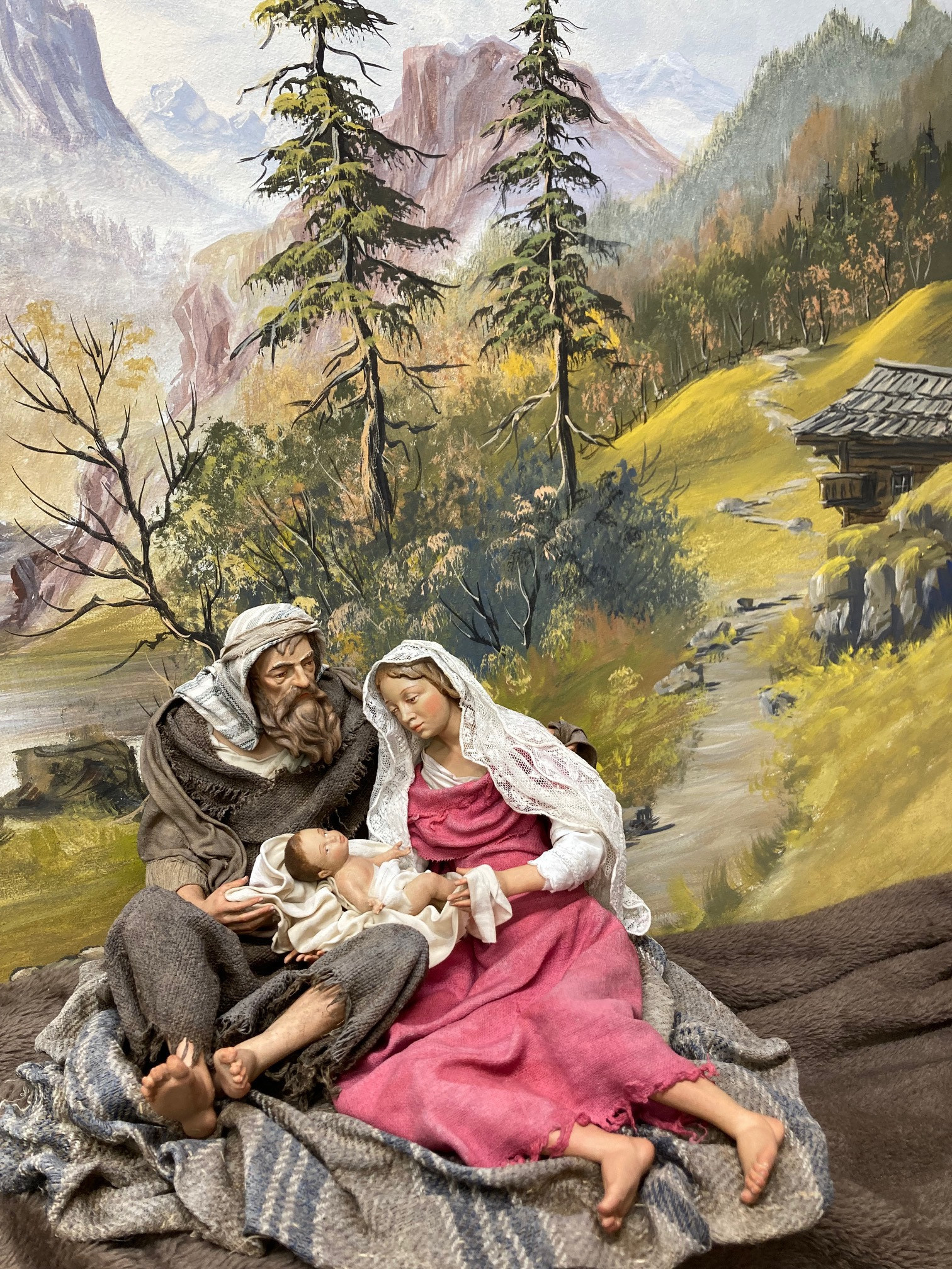Krippenfiguren bekleiden